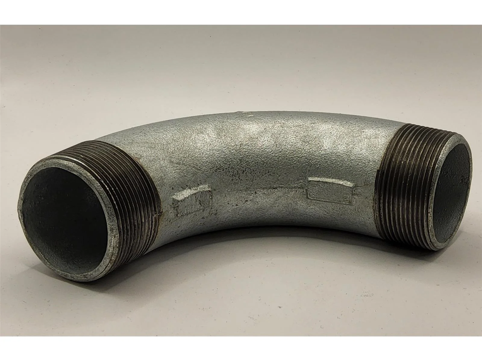 Curva a 90° in ghisa temperata con filetto esterno da 2 pollici SCHÜTZ